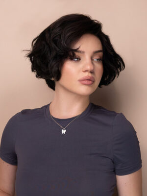 bouncy wedge human wig - 6" dark brown.