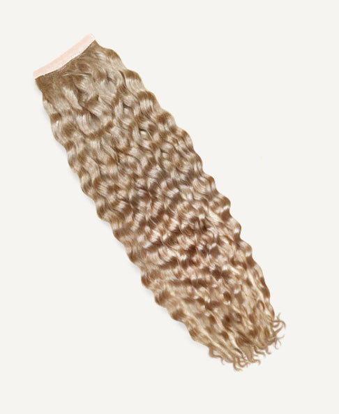 curly ponytail - #28 honey blonde. - 14 inches
