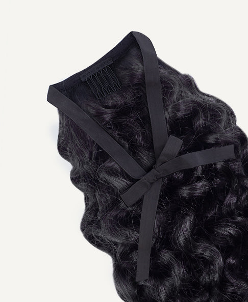 curly ponytail - #1 jet black. - 20 inches