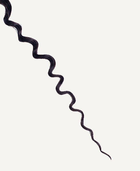 curly ponytail - #1 jet black. - 20 inches