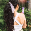 curly ponytail - #1b natural black. - 14 inches